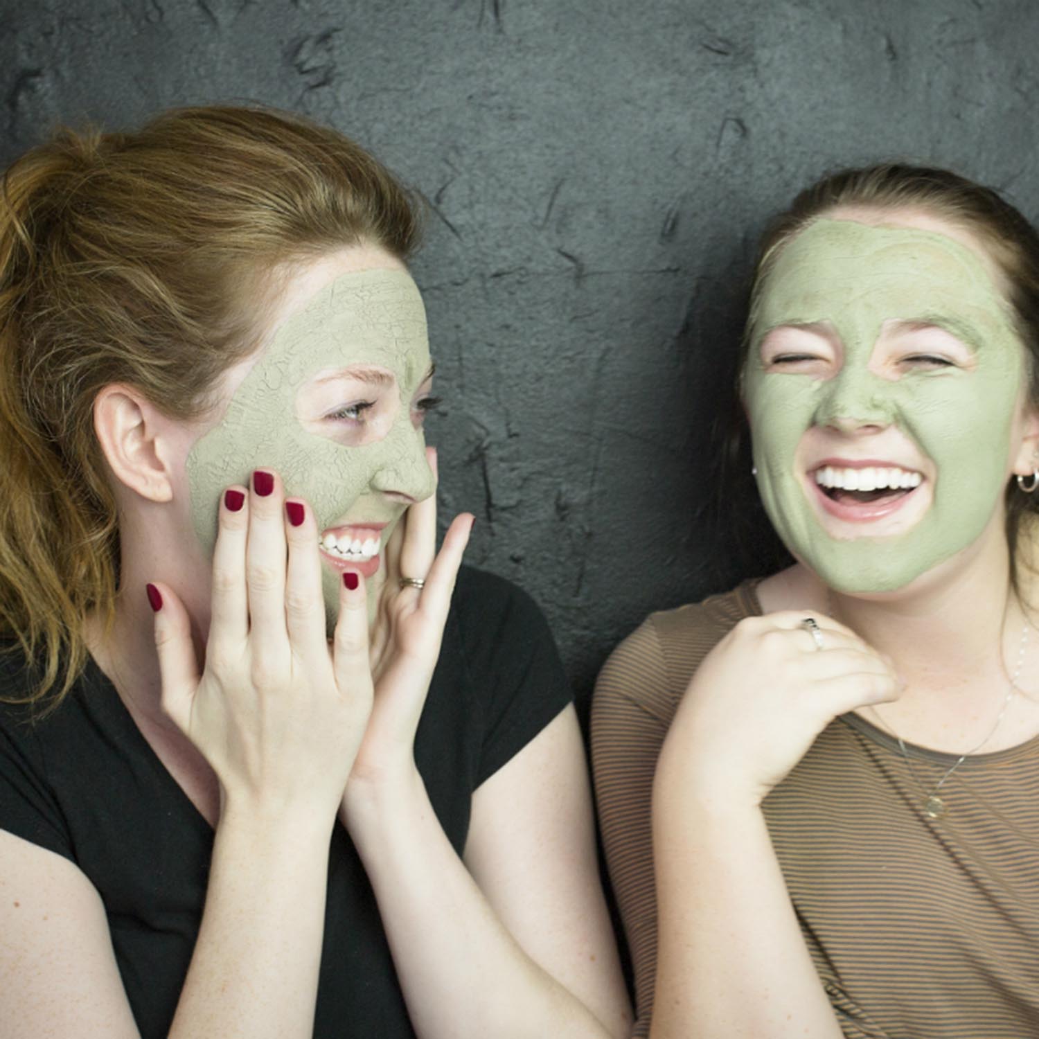 Girls with facial masks on enjoying themselves Alise Body Care